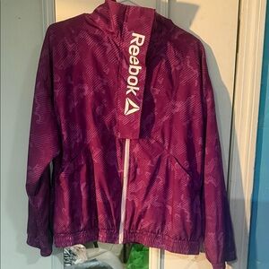 Reebok women’s Magenta Raincoat